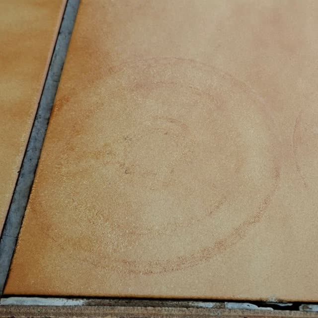 The same floor tile with the stains removed